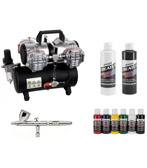 set di aerografia professionale su banco da lavoro