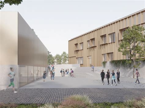 Edificio scolastico moderno inserito in un contesto territoriale piemontese