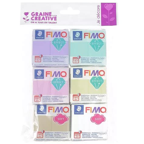 palette di colori applicati a panetti di pasta polimerica