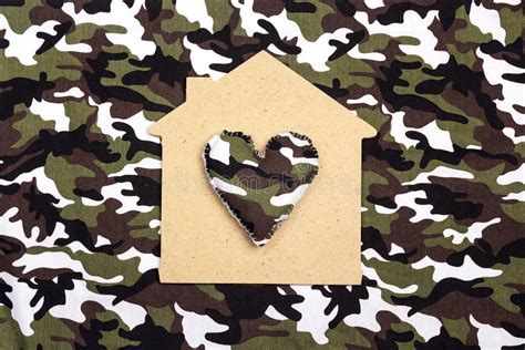 Simbolo di una casa con un cuore
