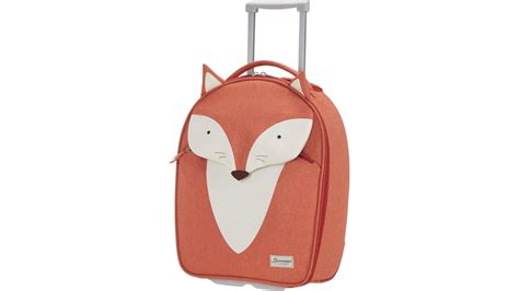 bambino che prepara una piccola valigia Samsonite