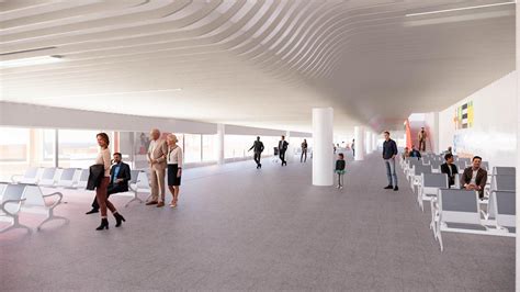 Interno del terminal dell'Aeroporto di Carrasco, con aree commerciali e di attesa