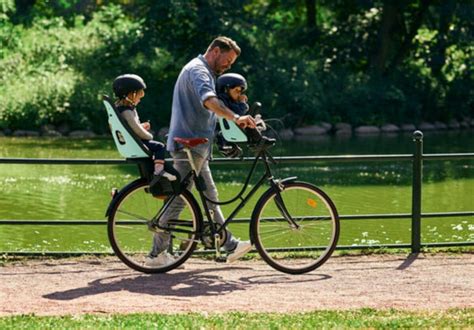 Schema comparativo tra seggiolino anteriore, posteriore e rimorchio per bambini