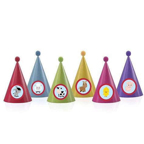 Tavolo decorato con cappellini a cono di vari colori
