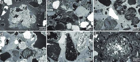 Microscopia ottica di un frammento di feldspato con inclusioni metalliche