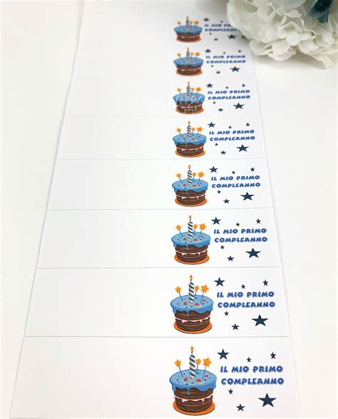 Un elegante set di bomboniere per il primo compleanno con dettagli in azzurro
