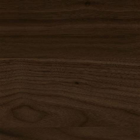 Dettaglio delle venature del legno di un lettino color noce scuro