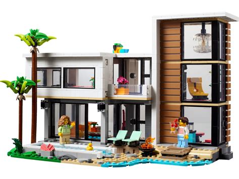 bambina che costruisce un set LEGO complesso