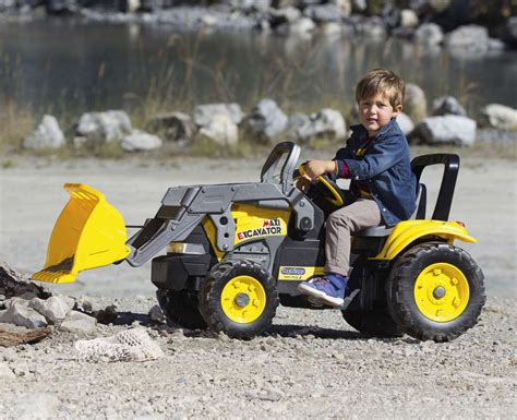 Bambino seduto sul sedile regolabile del Maxi Excavator