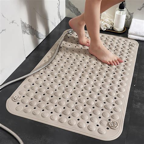 Dettaglio della superficie di un tappeto pieghevole in XPE che mostra la texture antiscivolo e la facilità con cui si ripiega in pochi secondi.