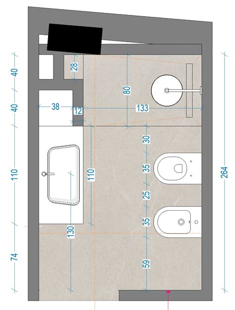 Schema di suddivisione di un bagno esistente in due, con particolare attenzione all'accesso e alle dimensioni.