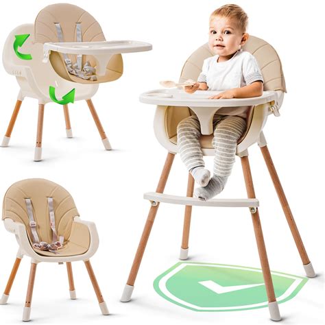 Child eating independently in high chair