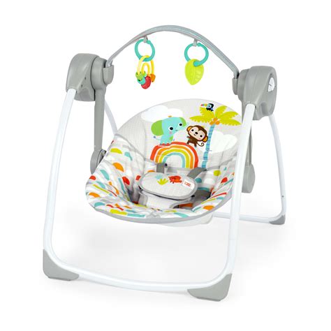 Baby swing in action with a baby sleeping peacefully