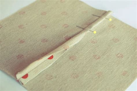 Dettaglio delle cuciture e del sistema di chiusura del sacco invernale