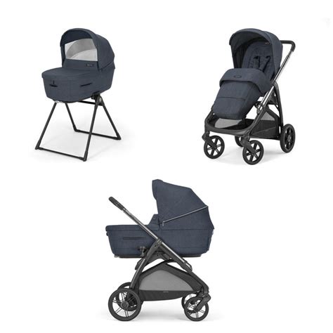 Baby sleeping peacefully in an Inglesina pram with a liner