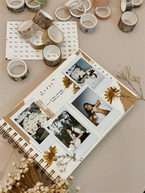 album fotografico finito con decorazioni in rilievo e nastrino di chiusura