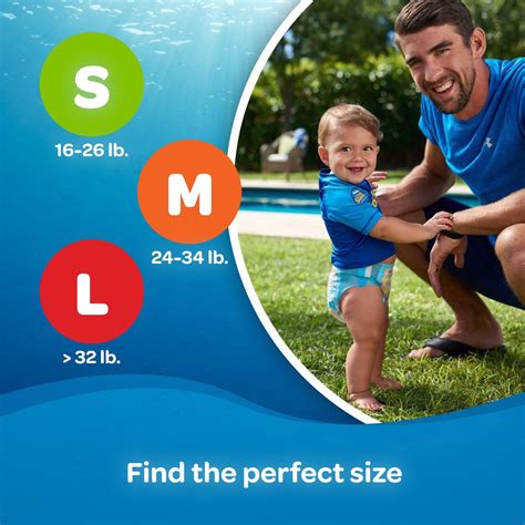 Bambino che indossa un pannolino-costumino Huggies Little Swimmers in piscina