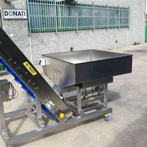Nastro trasportatore estrattore con sistema di pesatura
