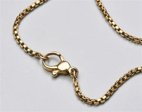 catenina d'oro con medaglietta per battesimo