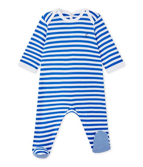 Bambino felice in tutina a righe