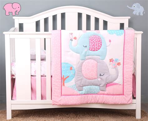 Baby crib with assorted bedding set