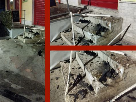 Immagine: Danni da sfondamento con masso all'ingresso di un negozio