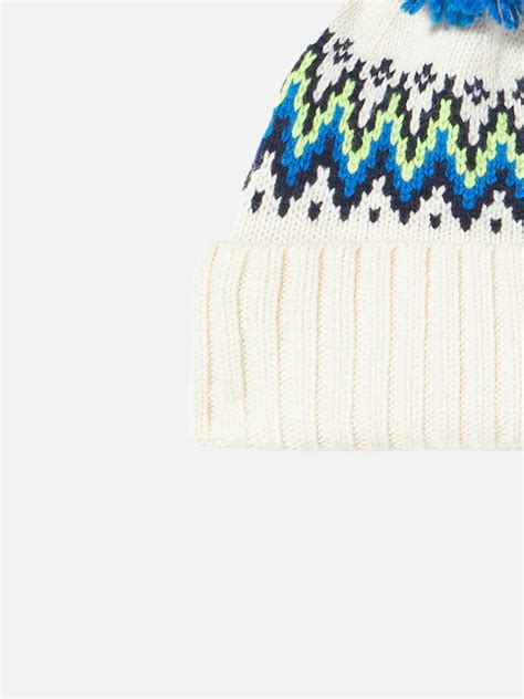 Copertina jacquard con coniglio e pompon