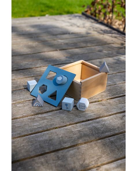 Scatola a incastro in legno con forme geometriche