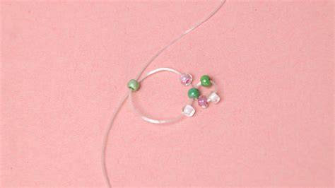 Anello portatovagliolo con perline e elastico