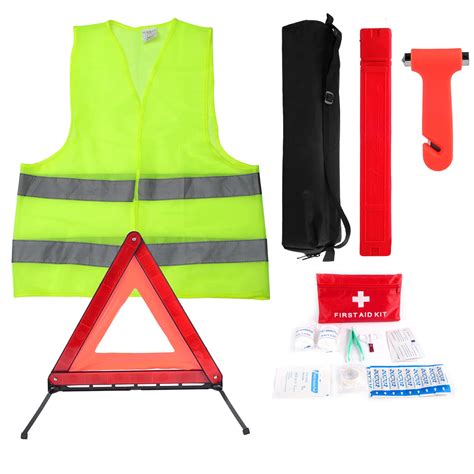 Essential car safety accessories including a reflective vest, warning triangle, first aid kit, and jump starter cables