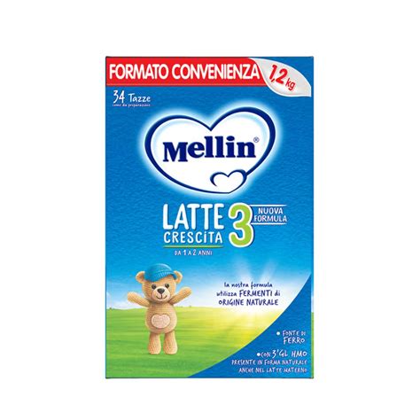 Biberon con latte in polvere e confezione con istruzioni