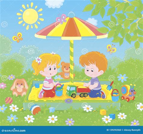 Bambini che giocano in una sabbiera con ombrellone