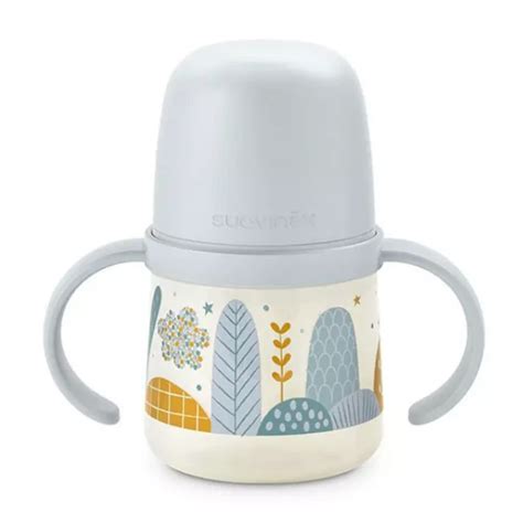 Bambino che tiene la tazza Suavinex con i manici