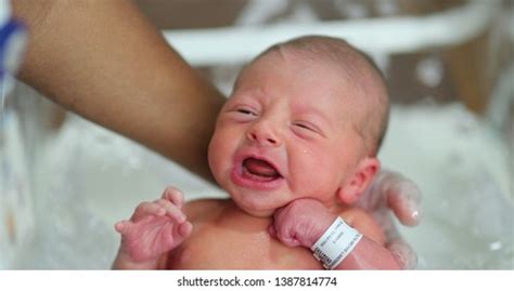 Newborn crying during bath time