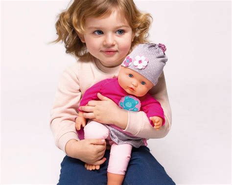 Child hugging Nenuco doll, demonstrating emotional connection