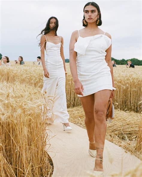 Jacquemus fashion show in wheat field with bed