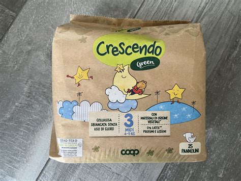Tavolo da cambio con pannolini Coop Crescendo, salviettine e crema all'ossido di zinco