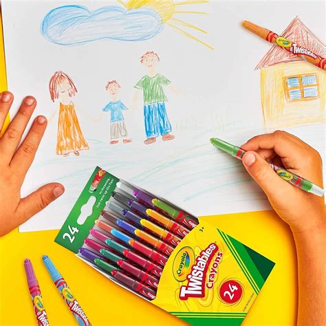 bambino che colora con pastelli a cera
