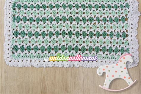 Diverse copertine neonato all'uncinetto con vari punti