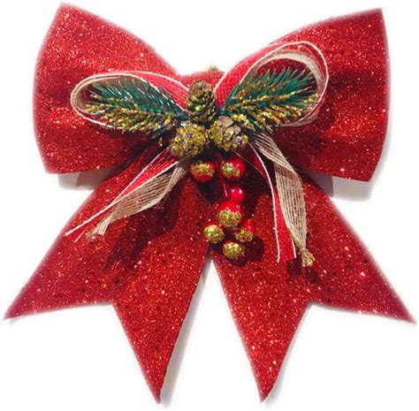 cuffie prenatali appoggiate su un pancione decorato con fiocchi natalizi