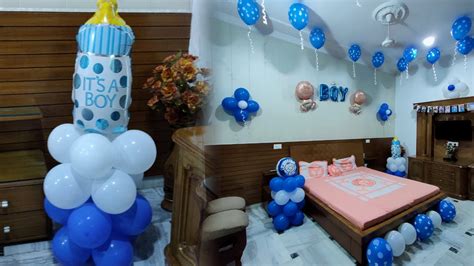 House decorated with balloons and banners for a newborn boy
