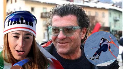 Ritratto di Alberto Tomba sorridente con la neve sullo sfondo