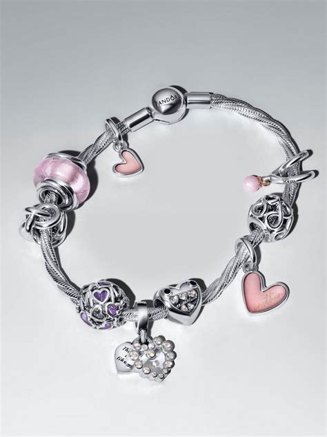 Pandora charms on a bracelet representing personal stories