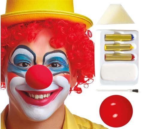 Trucco da clown horror con denti appuntiti e ferite finte