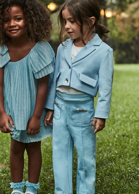Accessori eleganti per completi da bambino e bambina