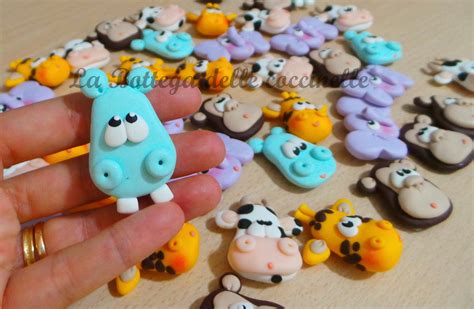 collezione di bomboniere in fimo fatte a mano per nascita, con soggetti delicati e colori pastello