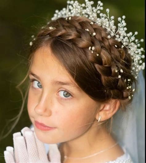 bambina acconciatura comunione con fiori