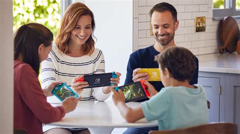 Nintendo Switch console con famiglia che gioca
