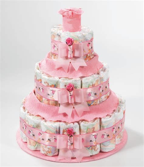 torta di pannolini a tre piani decorata con nastri e peluche