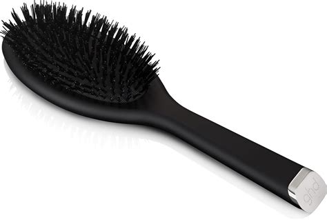 spazzola con setole morbide e pettine delicato